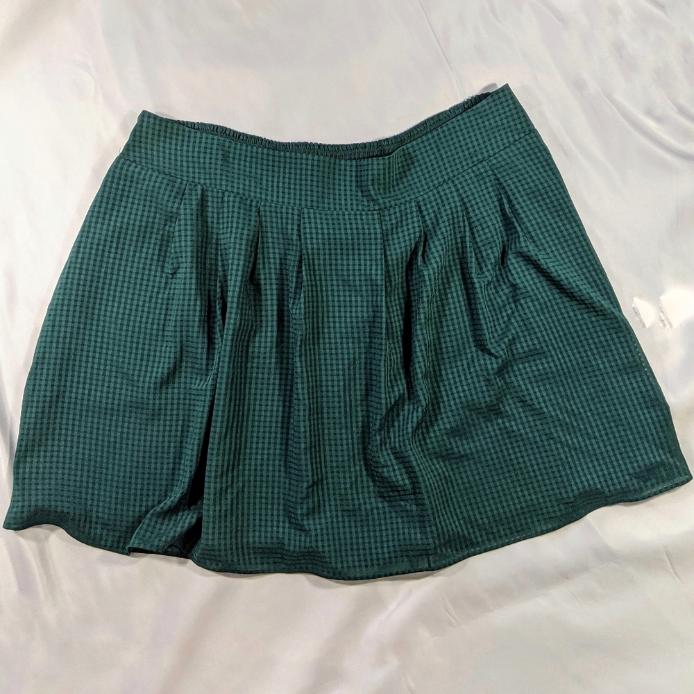Beautiful plus-size flowy, green mini